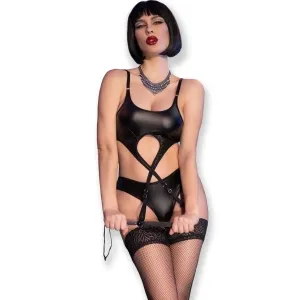 Person in black leather outfit with fishnet stockings and necklace, holding a whip, against a white background.