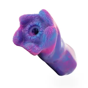 Abstract, colorful sculpture in purple and pink with organic shapes and a textured surface.