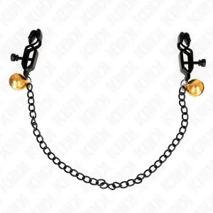 Schwarze Klammern mit Kette und goldenen Glocken an den Enden, auf weißem Hintergrund.