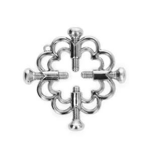 Metallic, cross-shaped piece of jewelry with screws and curved elements on a white background.