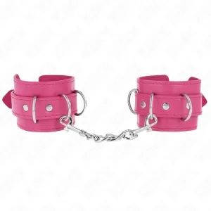 Pink leather handcuffs with metal chain and buckles, on a white background.