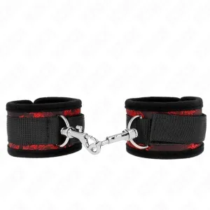 Black and red handcuffs with metal connection, on a white background.