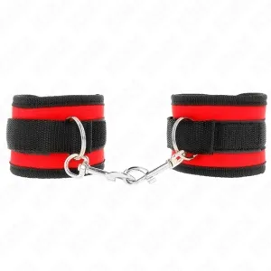 Black and red handcuffs with Velcro fasteners, connected by a metal chain.