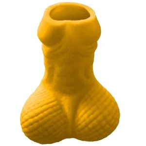 Yellow vase in the shape of a muscular torso with a textured surface.