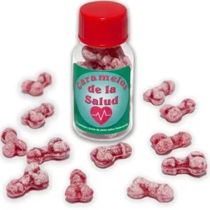 A red candy jar labeled 