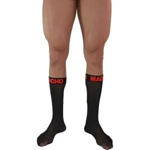 Beine in schwarzen Socken mit rotem 