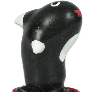 Black and white toy in the shape of an animal with red details, on a white background.