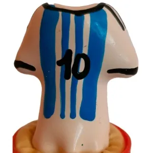 Small jersey with blue stripes and the number 10 on a red base.