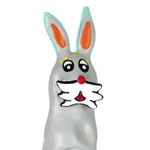Grey chocolate bunny with colorful details, big eyes and red ears.