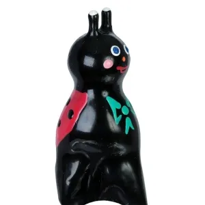 Black ladybug figurine with red wings and colorful details, smiling with big eyes.