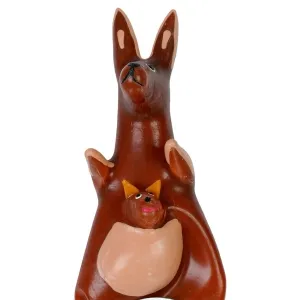 Ceramic kangaroo with baby in pouch, brown and orange, on a white background.