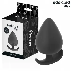 Schwarzer Analplug von Addicted Toys, 11 cm, neben der Verpackung.