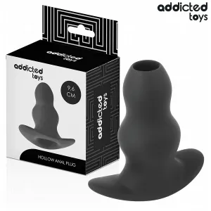 Schwarzer, hohler Analplug von Addicted Toys, 9,6 cm, neben der Verpackung abgebildet.