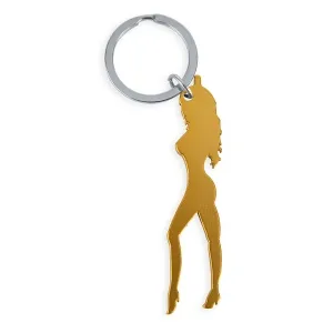 Schlüsselanhänger mit Silhouette einer Frau in Goldoptik, an einem silbernen Ring befestigt.