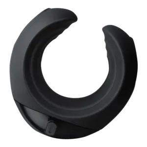 Black, semicircular object with a smooth surface and a small button on the underside.