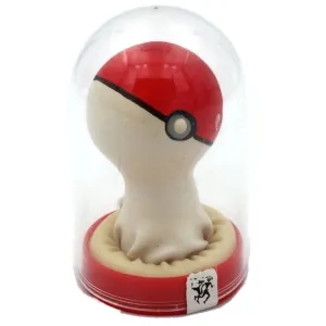 Red and white figure in a transparent dome resembling a Poké Ball, on a red base.