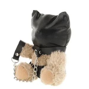 Plush bear with black leather hood and chain, sitting with its back to the camera.