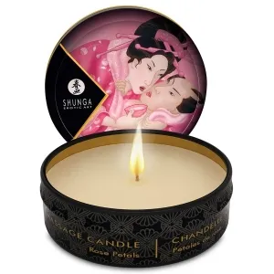 Runde Massagekerze mit brennender Flamme, Deckel zeigt japanische Kunst mit zwei Personen in rosa Gewändern.