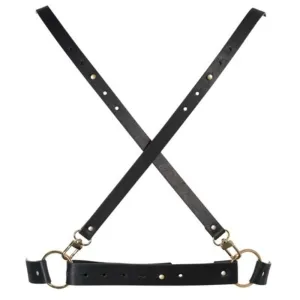 Schwarzes Leder-Harness mit goldenen Ringen und Schnallen, in X-Form angeordnet.