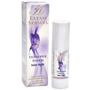 Bottle and packaging of Extase Sensuel Ultra Silk Touch Satin Night with butterfly design.