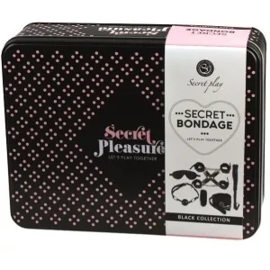 Schwarze Box mit rosa Punkten, Aufschrift 