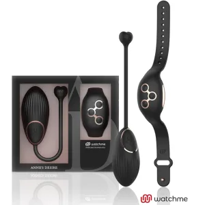 Schwarzes, elegantes Wearable-Set mit Fernbedienung und Armband, präsentiert in einer stilvollen Verpackung.