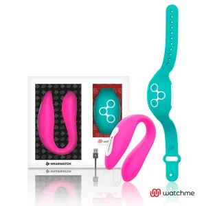 Pinkes und türkisfarbenes Wearable-Set mit Verpackung und USB-Kabel auf weißem Hintergrund.